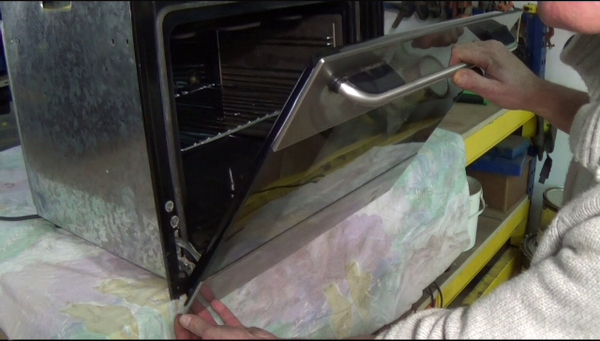 Cooker door glass has come loose on the bracket or hinge. How to repair