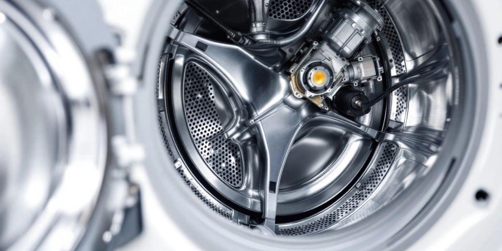 Internal components of a washing machine photographed clearly.